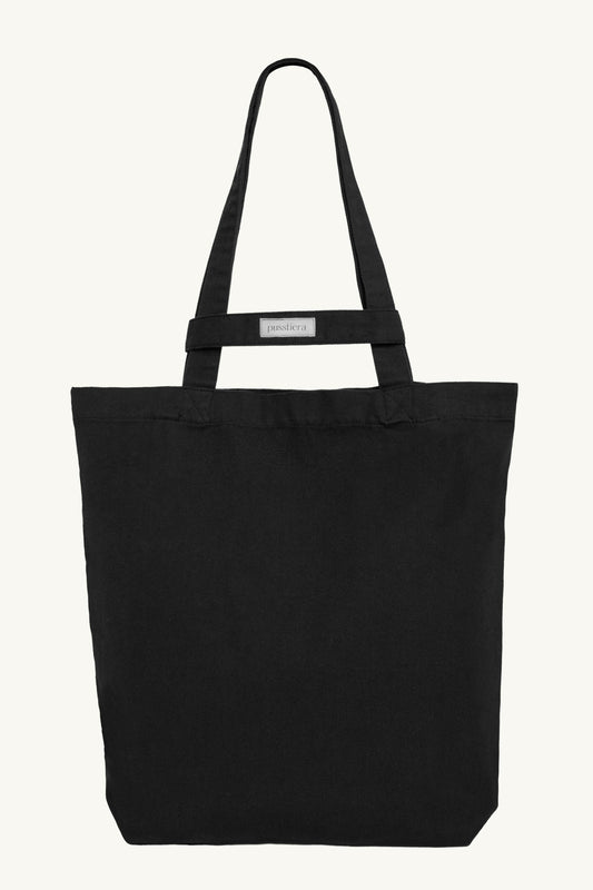 pusstiera tote bag An elegant sustainable cotton canvas tote bag, eco-friendly, premium Swedish design with Scandinavian quality, made in Europe, in limited edition numbered bags. Black caviar color with four utility loops and a stabilizing strap
