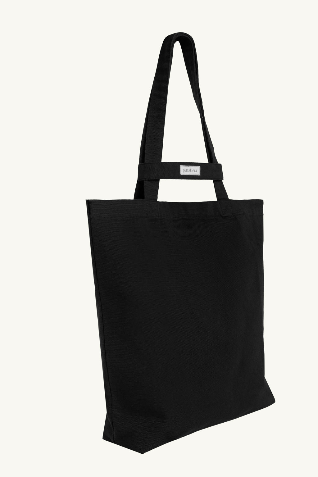 pusstiera tote bag An elegant sustainable cotton canvas tote bag, eco-friendly, premium Swedish design with Scandinavian quality, made in Europe, in limited edition numbered bags. Black caviar color with four utility loops and a stabilizing strap