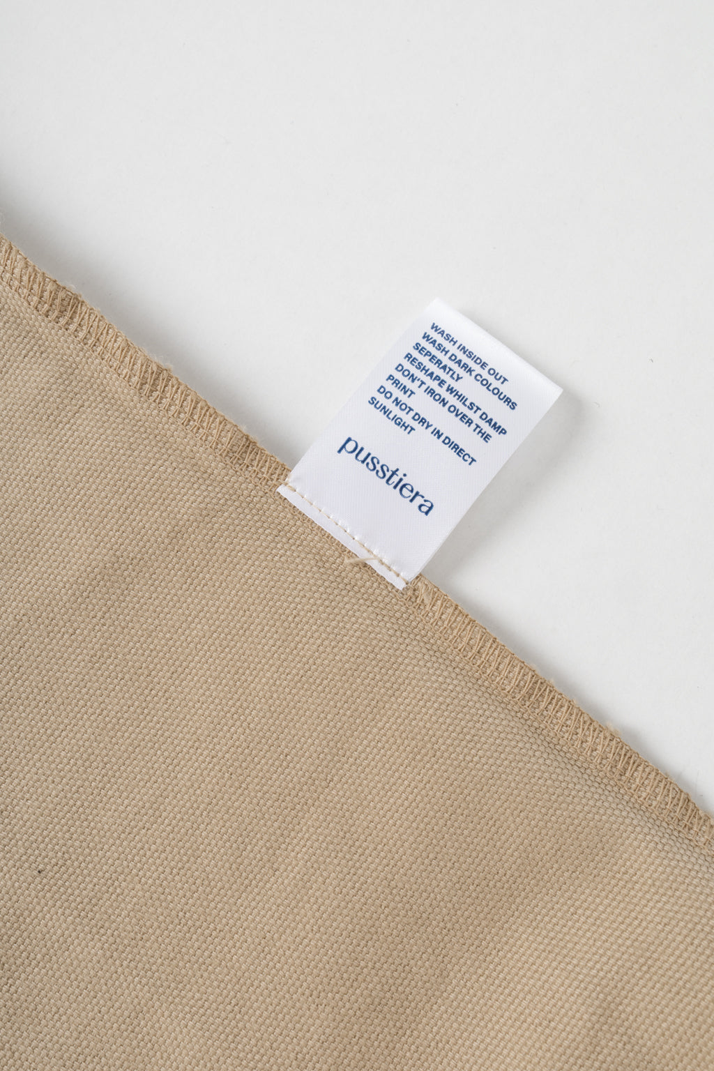 pusstiera tote bag An elegant sustainable cotton canvas tote bag, eco-friendly, premium Swedish design with Scandinavian quality, made in Europe, in limited edition numbered bags. care tag
