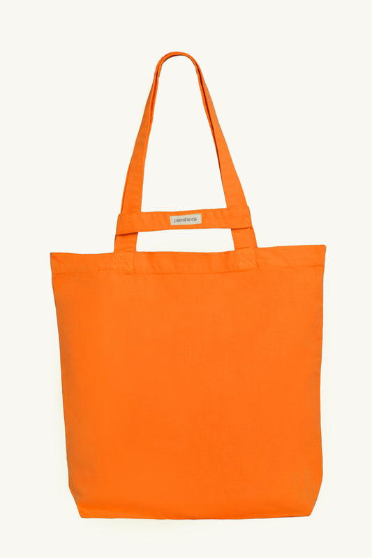 pusstiera tote bag An elegant sustainable cotton canvas tote bag, eco-friendly, premium Swedish design with Scandinavian quality, made in Europe, in limited edition numbered bags. vivid orange color with four utility loops and a stabilizing strap
