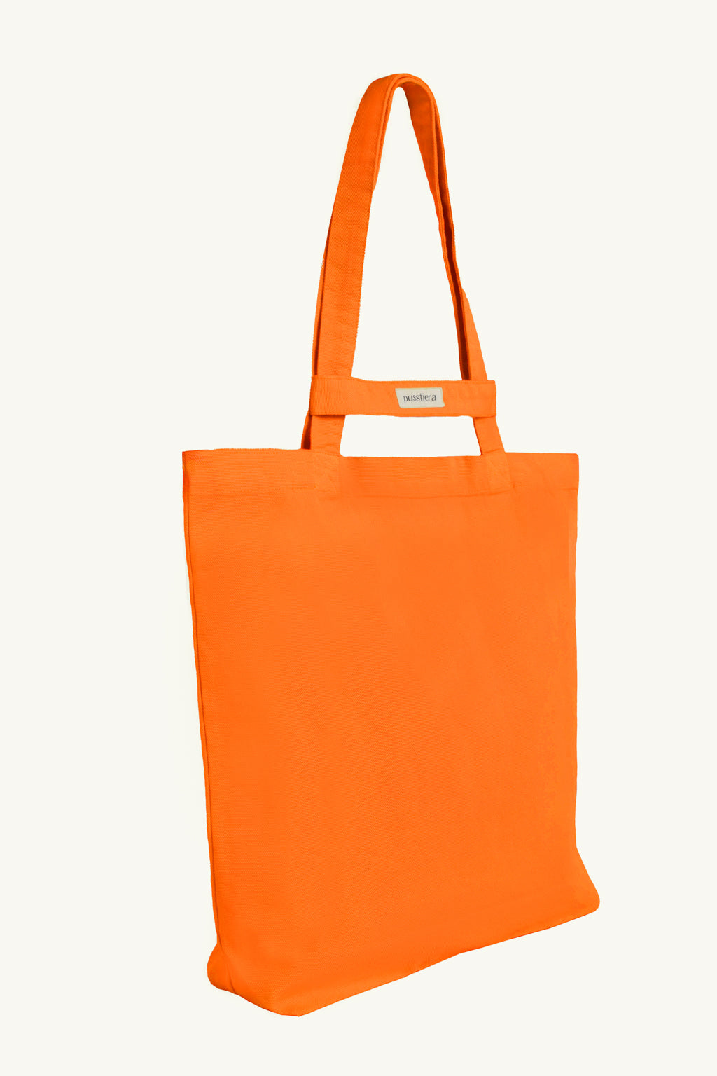 pusstiera tote bag An elegant sustainable cotton canvas tote bag, eco-friendly, premium Swedish design with Scandinavian quality, made in Europe, in limited edition numbered bags. vivid orange color with four utility loops and a stabilizing strap
