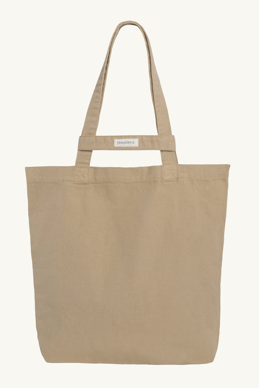 pusstiera tote bag An elegant sustainable cotton canvas tote bag, eco-friendly, premium Swedish design with Scandinavian quality, made in Europe, in limited edition numbered bags. Warm taupe color with four utility loops and a stabilizing strap