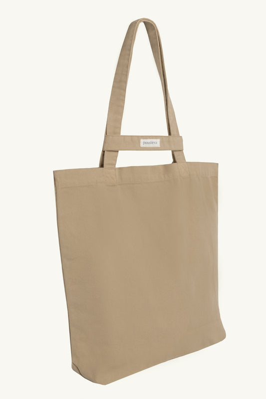 pusstiera tote bag An elegant sustainable cotton canvas tote bag, eco-friendly, premium Swedish design with Scandinavian quality, made in Europe, in limited edition numbered bags. Warm taupe color with four utility loops and a stabilizing strap